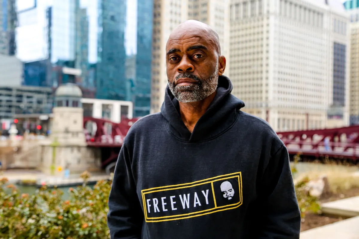 Ricky Ross wearing a Freeway hoodie outdoors